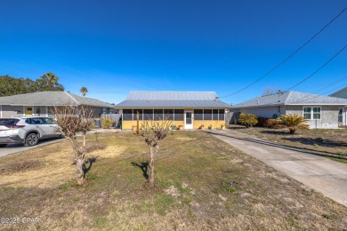 Beach Bungalow is located in the quaint neighborhood of Beach 87 on Sharks Tooth Golf Club in Florida - for sale on GolfHomes.com, golf home, golf lot