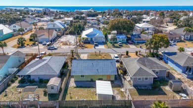 Beach Bungalow is located in the quaint neighborhood of Beach 87 on Sharks Tooth Golf Club in Florida - for sale on GolfHomes.com, golf home, golf lot