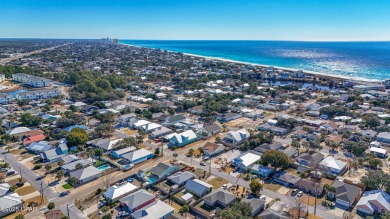 Beach Bungalow is located in the quaint neighborhood of Beach 87 on Sharks Tooth Golf Club in Florida - for sale on GolfHomes.com, golf home, golf lot