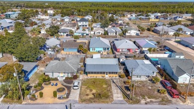 Beach Bungalow is located in the quaint neighborhood of Beach 87 on Sharks Tooth Golf Club in Florida - for sale on GolfHomes.com, golf home, golf lot
