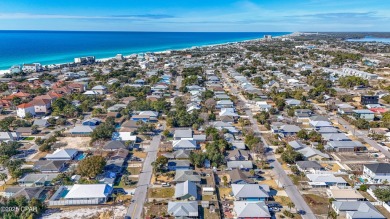 Beach Bungalow is located in the quaint neighborhood of Beach 87 on Sharks Tooth Golf Club in Florida - for sale on GolfHomes.com, golf home, golf lot