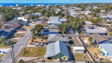 Beach Bungalow is located in the quaint neighborhood of Beach 87 on Sharks Tooth Golf Club in Florida - for sale on GolfHomes.com, golf home, golf lot