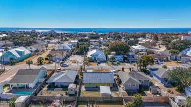 Beach Bungalow is located in the quaint neighborhood of Beach 87 on Sharks Tooth Golf Club in Florida - for sale on GolfHomes.com, golf home, golf lot