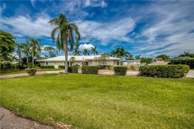 Diamond in the rough Estate home overlooking the #5 hole of on Cypress Lake Country Club in Florida - for sale on GolfHomes.com, golf home, golf lot