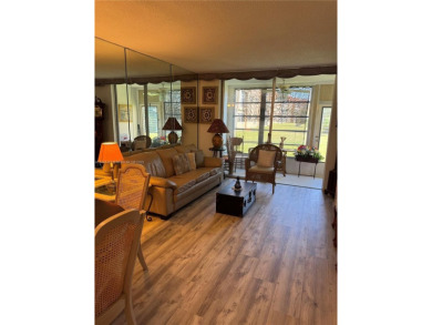 Spacious and cozy 1 bedroom, 1 bathroom condo with lots of on Sunrise Lakes Phase III in Florida - for sale on GolfHomes.com, golf home, golf lot