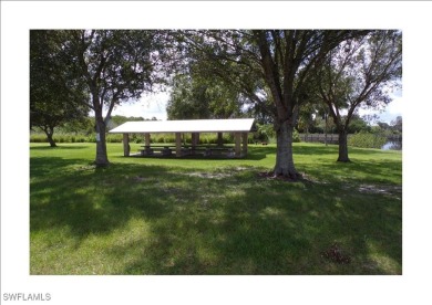 This lot is on a quiet street that would be a great place to on Live Oak Golf Club and RV Park in Florida - for sale on GolfHomes.com, golf home, golf lot