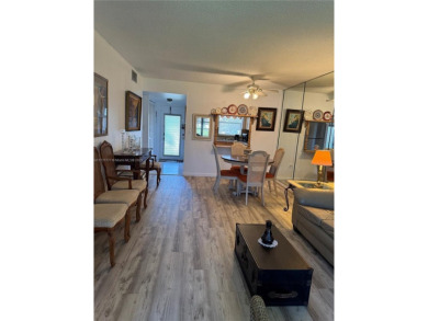 Spacious and cozy 1 bedroom, 1 bathroom condo with lots of on Sunrise Lakes Phase III in Florida - for sale on GolfHomes.com, golf home, golf lot