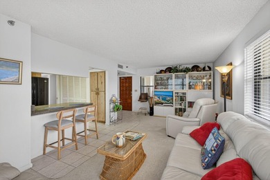 Spacious 2000+ sq. ft. corner unit overlooking the intracoastal on North Palm Beach Country Club in Florida - for sale on GolfHomes.com, golf home, golf lot