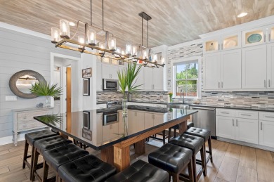 Residing in the resort-inspired community of The Retreat at on Seascape Golf Course in Florida - for sale on GolfHomes.com, golf home, golf lot