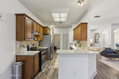 Welcome to this stunning 4-bedroom, 3-bathroom home in a on Magnolia Point Golf and Country Club in Florida - for sale on GolfHomes.com, golf home, golf lot