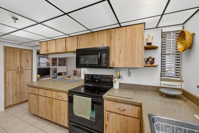 Spacious 2000+ sq. ft. corner unit overlooking the intracoastal on North Palm Beach Country Club in Florida - for sale on GolfHomes.com, golf home, golf lot