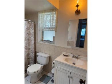 Spacious and cozy 1 bedroom, 1 bathroom condo with lots of on Sunrise Lakes Phase III in Florida - for sale on GolfHomes.com, golf home, golf lot