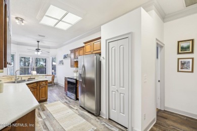 Welcome to this stunning 4-bedroom, 3-bathroom home in a on Magnolia Point Golf and Country Club in Florida - for sale on GolfHomes.com, golf home, golf lot