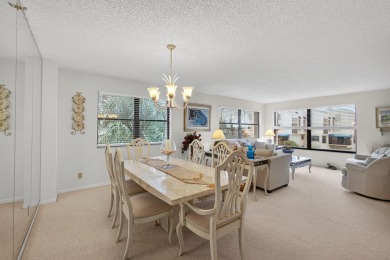 Spacious 2000+ sq. ft. corner unit overlooking the intracoastal on  in Florida - for sale on GolfHomes.com, golf home, golf lot