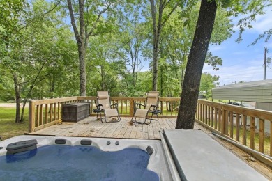 Discover this charming 2-bedroom, 2-bath retreat nestled under a on Links At Lands End in Texas - for sale on GolfHomes.com, golf home, golf lot