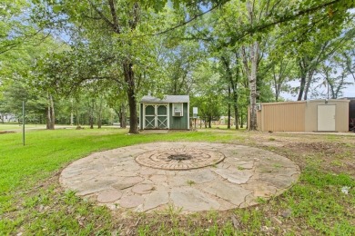 Discover this charming 2-bedroom, 2-bath retreat nestled under a on Links At Lands End in Texas - for sale on GolfHomes.com, golf home, golf lot