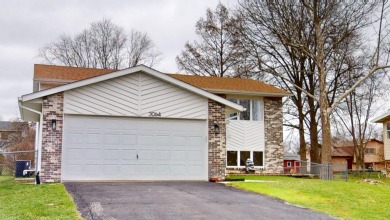 Nestled in the highly sought-after gated golf community of Lakes on Lakes of the Four Seasons Country Club in Indiana - for sale on GolfHomes.com, golf home, golf lot