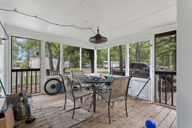 Discover this charming 2-bedroom, 2-bath retreat nestled under a on Links At Lands End in Texas - for sale on GolfHomes.com, golf home, golf lot