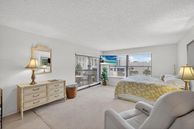 Spacious 2000+ sq. ft. corner unit overlooking the intracoastal on  in Florida - for sale on GolfHomes.com, golf home, golf lot