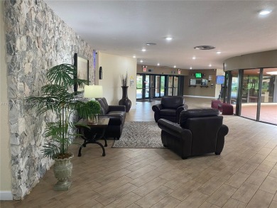 Spacious and cozy 1 bedroom, 1 bathroom condo with lots of on Sunrise Lakes Phase III in Florida - for sale on GolfHomes.com, golf home, golf lot