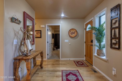 Situated on the 7th tee of Pinetop Lakes Country Club in the on Pinetop Lakes Golf and Country Club in Arizona - for sale on GolfHomes.com, golf home, golf lot