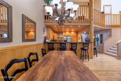 Situated on the 7th tee of Pinetop Lakes Country Club in the on Pinetop Lakes Golf and Country Club in Arizona - for sale on GolfHomes.com, golf home, golf lot