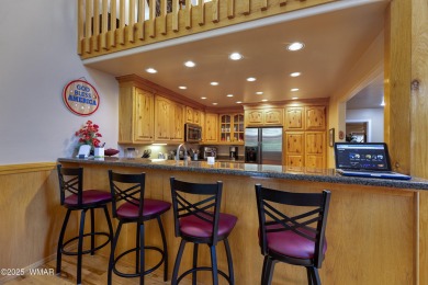 Situated on the 7th tee of Pinetop Lakes Country Club in the on Pinetop Lakes Golf and Country Club in Arizona - for sale on GolfHomes.com, golf home, golf lot