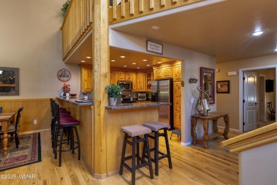 Situated on the 7th tee of Pinetop Lakes Country Club in the on Pinetop Lakes Golf and Country Club in Arizona - for sale on GolfHomes.com, golf home, golf lot
