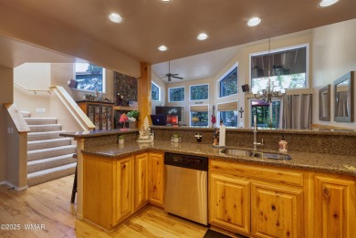 Situated on the 7th tee of Pinetop Lakes Country Club in the on Pinetop Lakes Golf and Country Club in Arizona - for sale on GolfHomes.com, golf home, golf lot