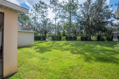 Welcome to this beautifully updated 3-bedroom, 2-bathroom home on Oaks National Golf Course in Florida - for sale on GolfHomes.com, golf home, golf lot