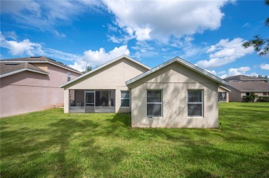 Welcome to this beautifully updated 3-bedroom, 2-bathroom home on Oaks National Golf Course in Florida - for sale on GolfHomes.com, golf home, golf lot