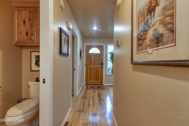 Situated on the 7th tee of Pinetop Lakes Country Club in the on Pinetop Lakes Golf and Country Club in Arizona - for sale on GolfHomes.com, golf home, golf lot