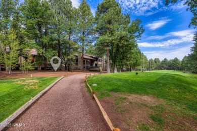 Situated on the 7th tee of Pinetop Lakes Country Club in the on Pinetop Lakes Golf and Country Club in Arizona - for sale on GolfHomes.com, golf home, golf lot