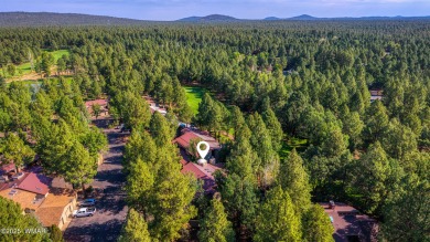 Situated on the 7th tee of Pinetop Lakes Country Club in the on Pinetop Lakes Golf and Country Club in Arizona - for sale on GolfHomes.com, golf home, golf lot