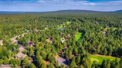 Situated on the 7th tee of Pinetop Lakes Country Club in the on Pinetop Lakes Golf and Country Club in Arizona - for sale on GolfHomes.com, golf home, golf lot