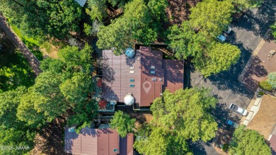 Situated on the 7th tee of Pinetop Lakes Country Club in the on Pinetop Lakes Golf and Country Club in Arizona - for sale on GolfHomes.com, golf home, golf lot