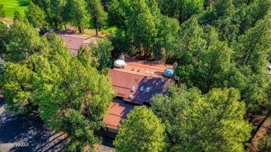 Situated on the 7th tee of Pinetop Lakes Country Club in the on Pinetop Lakes Golf and Country Club in Arizona - for sale on GolfHomes.com, golf home, golf lot