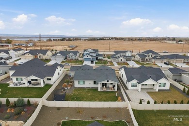 Welcome to 12602 S Teano Ave. This 2128 sqft, 3 bed, 2 bath home on Hunters Point Golf Club in ID - for sale on GolfHomes.com, golf home, golf lot