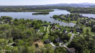 Enjoy Beautiful Lake Views while relaxing on your front porch on Tellico Village -The Links At Kahite Golf Course in Tennessee - for sale on GolfHomes.com, golf home, golf lot