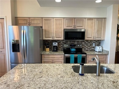 Please take a look at this totally renovated Brookside condo on Naples Heritage Golf and Country Club in Florida - for sale on GolfHomes.com, golf home, golf lot