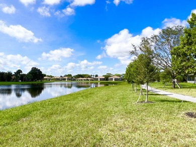 Priced to sell!! Lakefront Villa, located in a serene 55+ senior on Villa Del Ray Golf Club in Florida - for sale on GolfHomes.com, golf home, golf lot