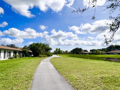 Priced to sell!! Lakefront Villa, located in a serene 55+ senior on Villa Del Ray Golf Club in Florida - for sale on GolfHomes.com, golf home, golf lot