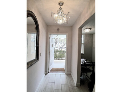 Beautifully remodeled, move-in-ready, two-bedroom, two-bathroom on Sunrise Lakes Phase IV Golf Course in Florida - for sale on GolfHomes.com, golf home, golf lot