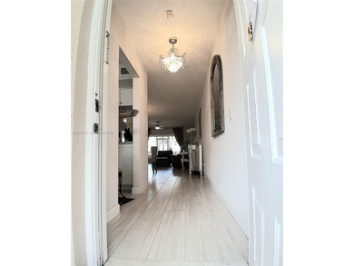 Beautifully remodeled, move-in-ready, two-bedroom, two-bathroom on Sunrise Lakes Phase IV Golf Course in Florida - for sale on GolfHomes.com, golf home, golf lot