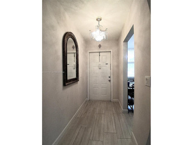 Beautifully remodeled, move-in-ready, two-bedroom, two-bathroom on Sunrise Lakes Phase IV Golf Course in Florida - for sale on GolfHomes.com, golf home, golf lot