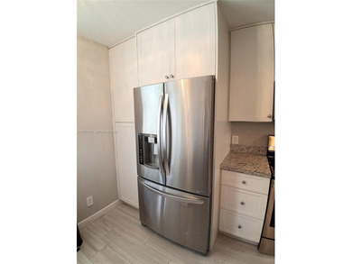 Beautifully remodeled, move-in-ready, two-bedroom, two-bathroom on Sunrise Lakes Phase IV Golf Course in Florida - for sale on GolfHomes.com, golf home, golf lot