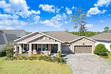 LIVE exceptionally in this 2022 custom-upgraded waterfront on Southern Hills Plantation Club in Florida - for sale on GolfHomes.com, golf home, golf lot