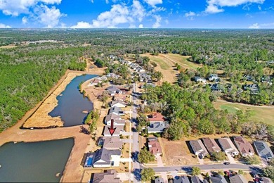 LIVE exceptionally in this 2022 custom-upgraded waterfront on Southern Hills Plantation Club in Florida - for sale on GolfHomes.com, golf home, golf lot