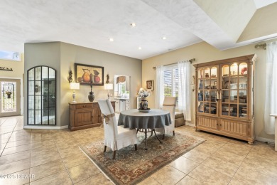 Nestled within the exclusive gates of the Plantation Bay on Plantation Bay Golf and Country Club in Florida - for sale on GolfHomes.com, golf home, golf lot