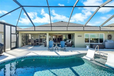 Rare find - Stretched Indigo Designer model with pool and water on Pennbrooke Fairways in Florida - for sale on GolfHomes.com, golf home, golf lot